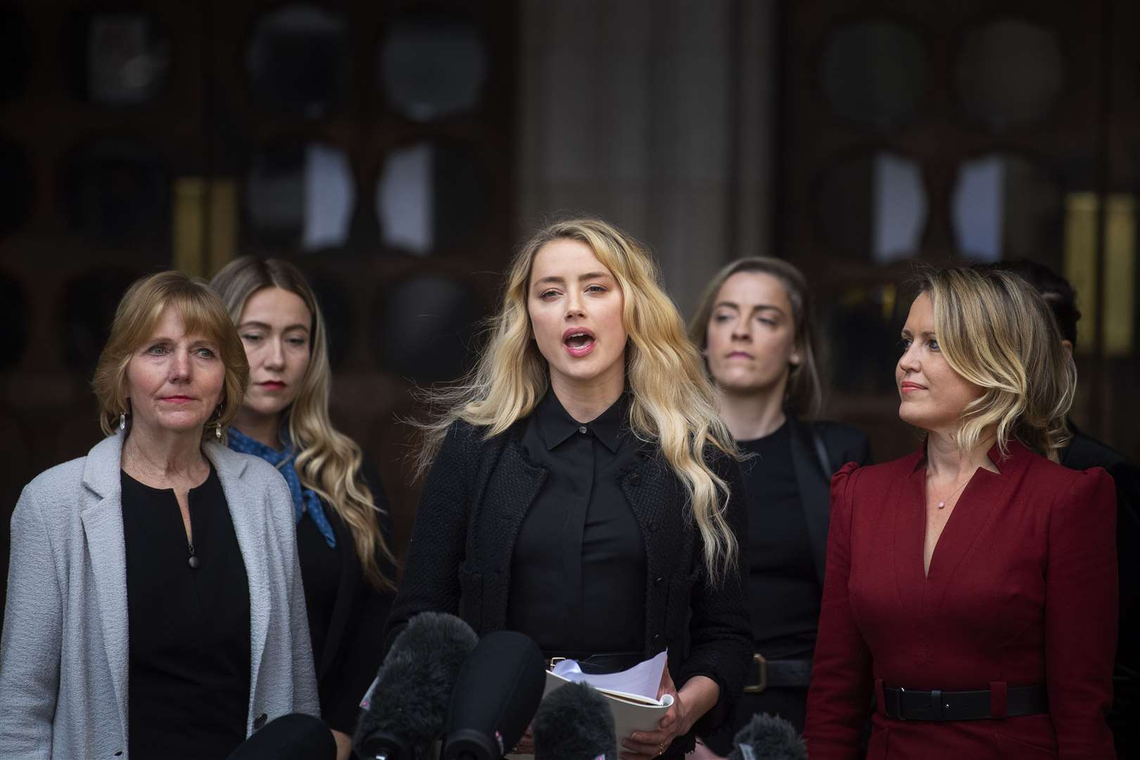 Actress Amber Heard made a statement on the steps of the Royal Courts of Justice in London on the final day of the trial (Victoria Jones/PA)