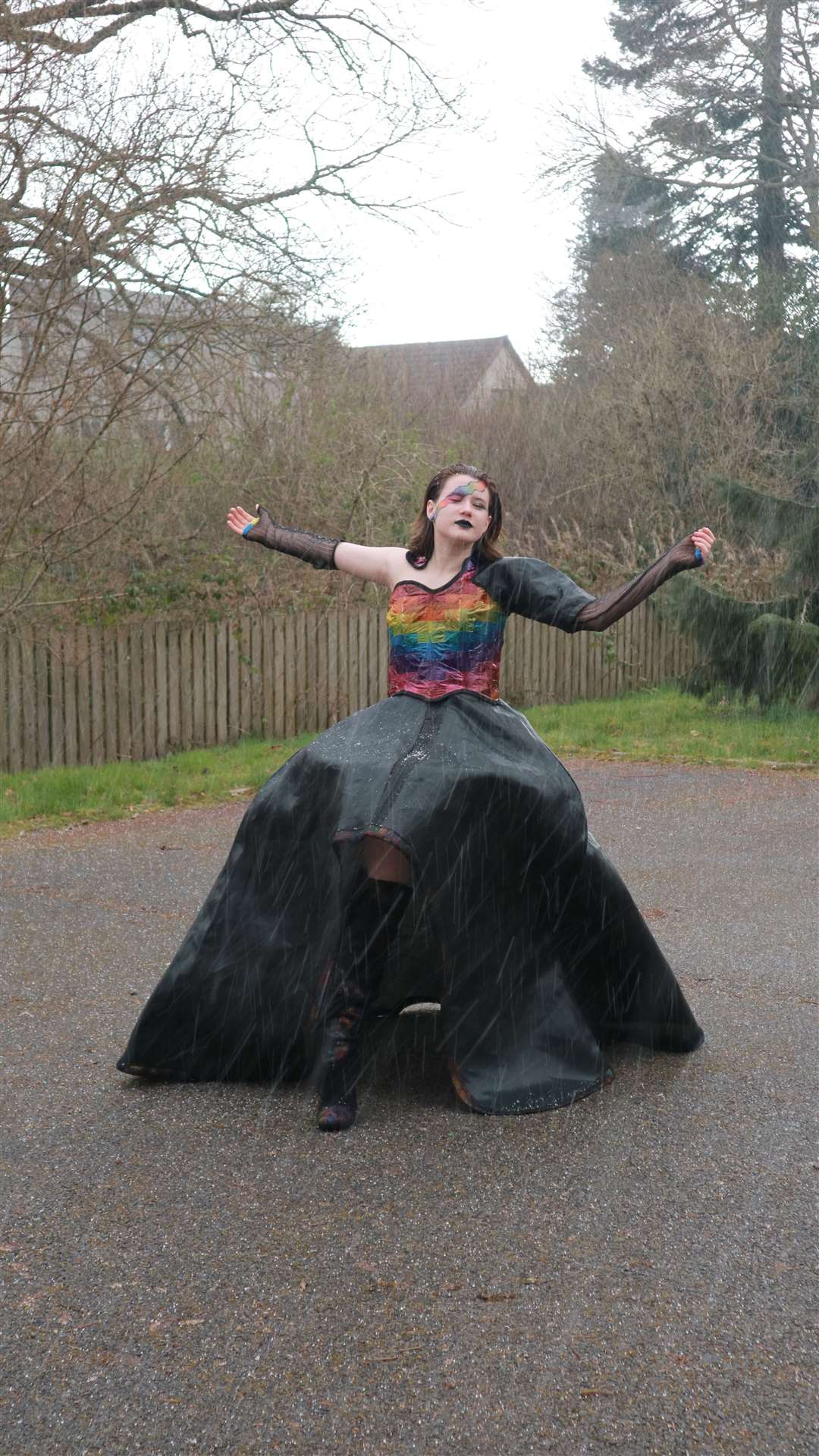 Recycled materials including a childhood trampoline were used to create a ball gown.