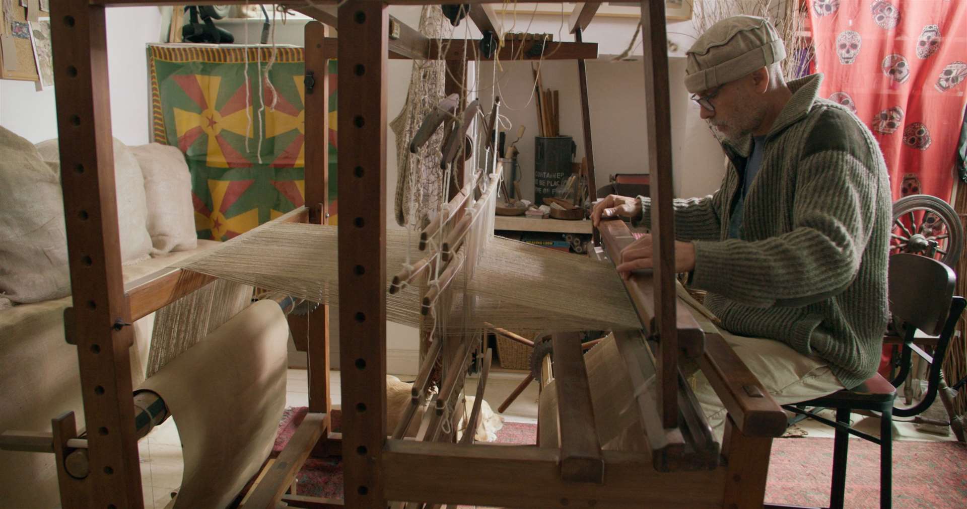Allan Brown weaving nettles to make a dress (Dylan Howitt/PA)