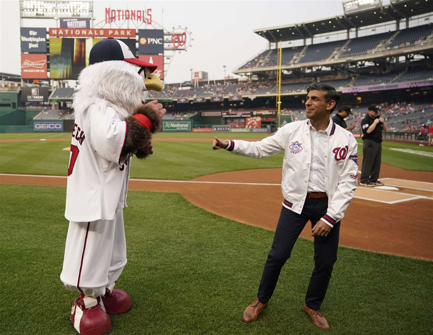 Prime Minister Rishi Sunak poses for pictures with Screech the Washington Nationals Mascot while attending the Washington Nationals v Arizona Diamondbacks baseball at Nationals Park during his visit to Washington DC in the US. (Niall Carson, PA)