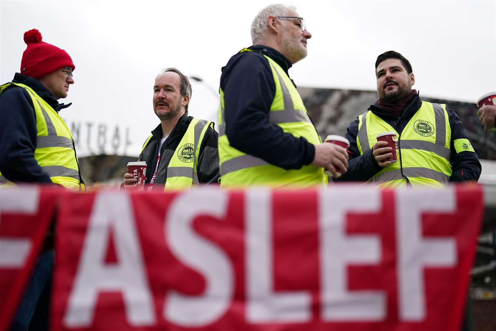Members of the Aslef union picket at New Street railway station in Birmingham (Jacob King/PA)