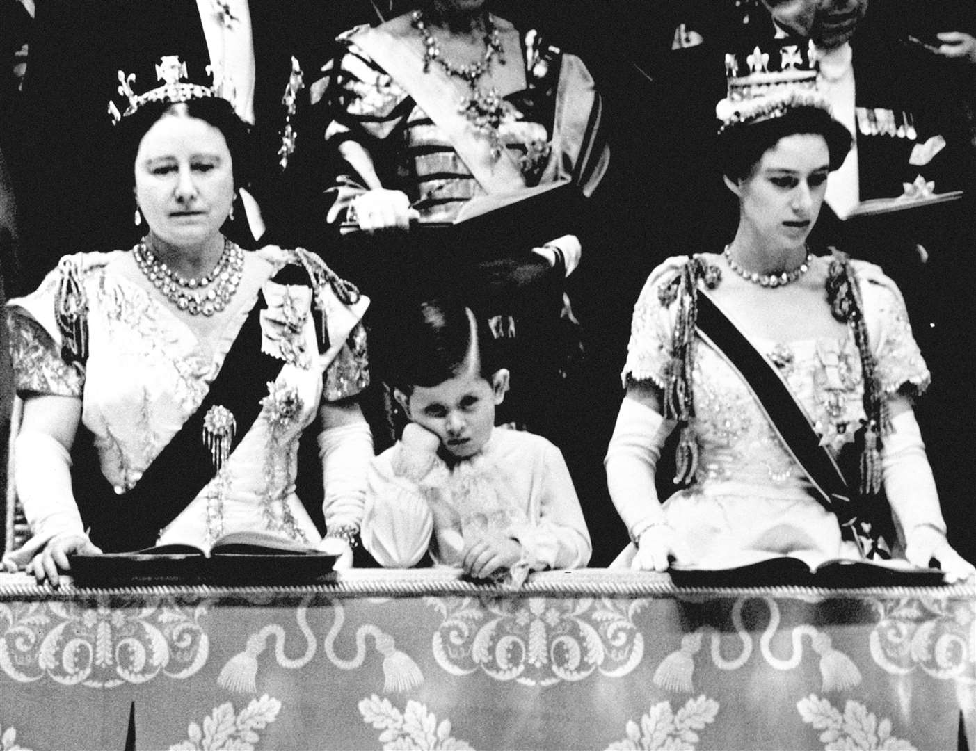 A bored-looking Prince Charles at his mother’s coronation (PA)