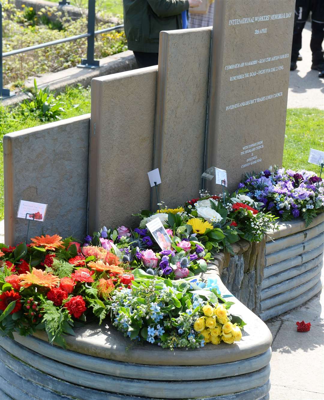 Floral tributes were placed on the memorial on International Workers' Memorial Day last year.