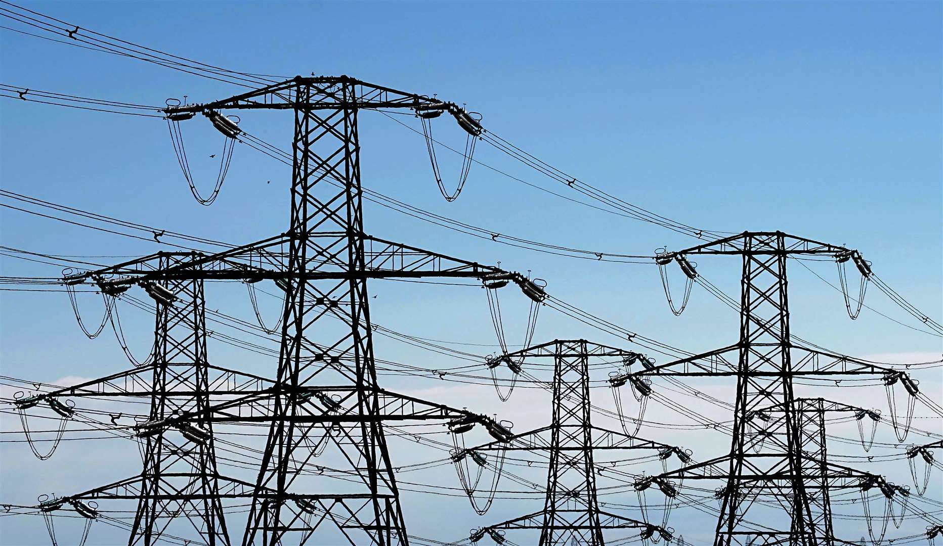 Households near new grid infrastructure are to be offered up to £10,000 off their electricity bills (Gareth Fuller/PA)