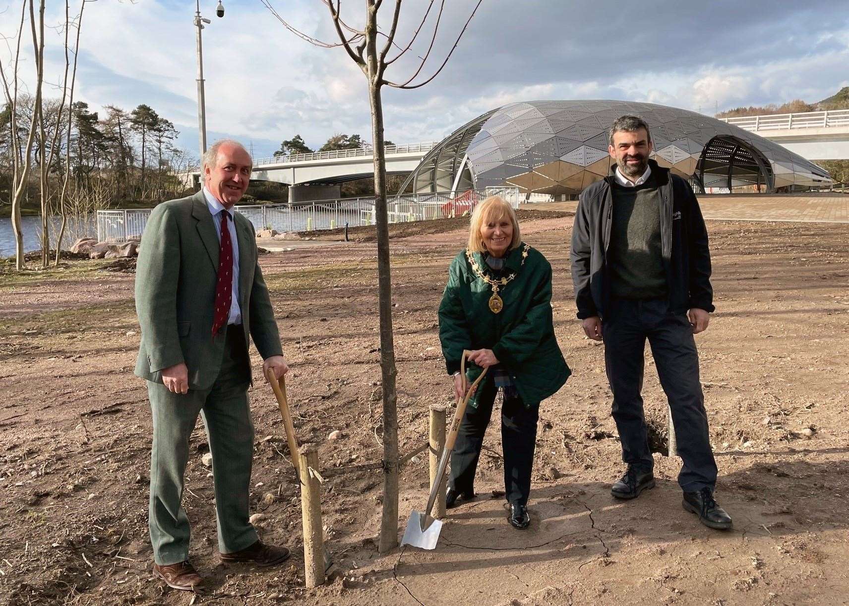 Lord-Lieutenant for Inverness James Wotherspoon, Provost and Leader of Inverness and Area Cllr Helen Carmichael and Inverness Botanic Gardens manager Ewan MacKintosh planting at the hydro scheme in Inverness.