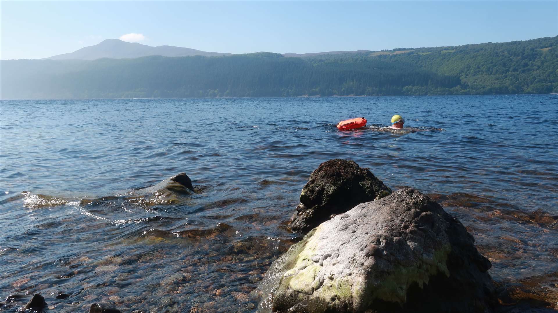 John swimming in Loch Ness with Meall Fuar-mhonaidh as the backdrop.