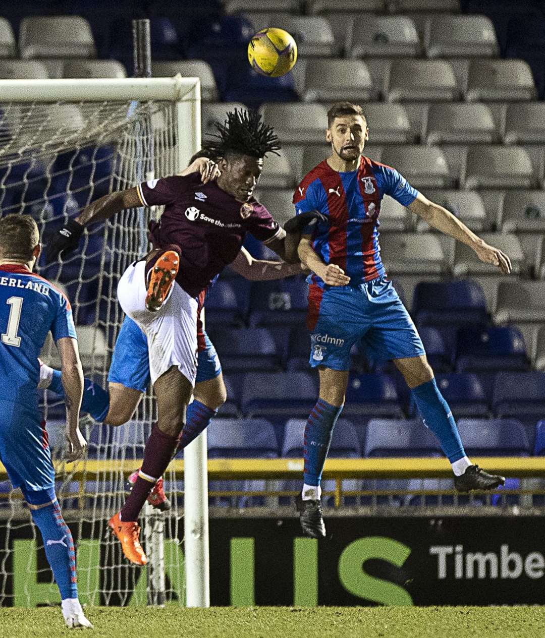 Picture - Ken Macpherson, Inverness. Inverness CT(1) v Hearts(1). 26.02.21. ICT’s Robbie Deas heads clear from Hearts' Armand Gnanduillet.