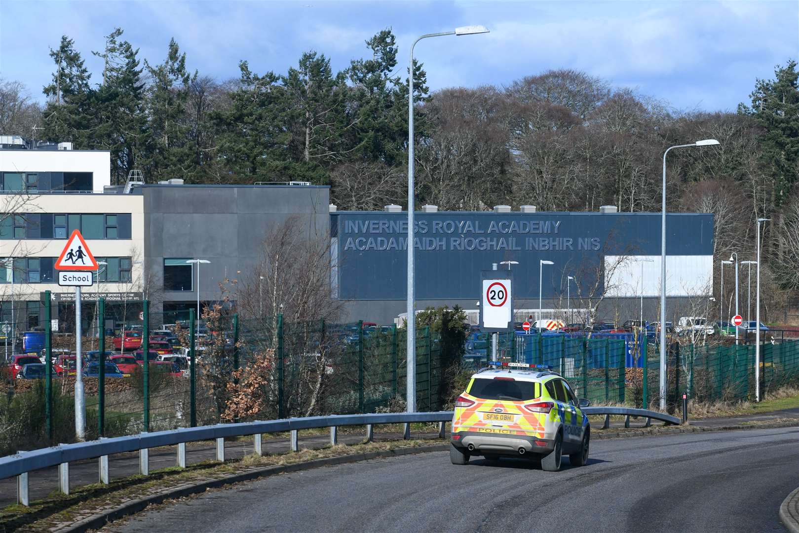 A police car seen patrolling near the Inverness Royal Academy following the malicious email.