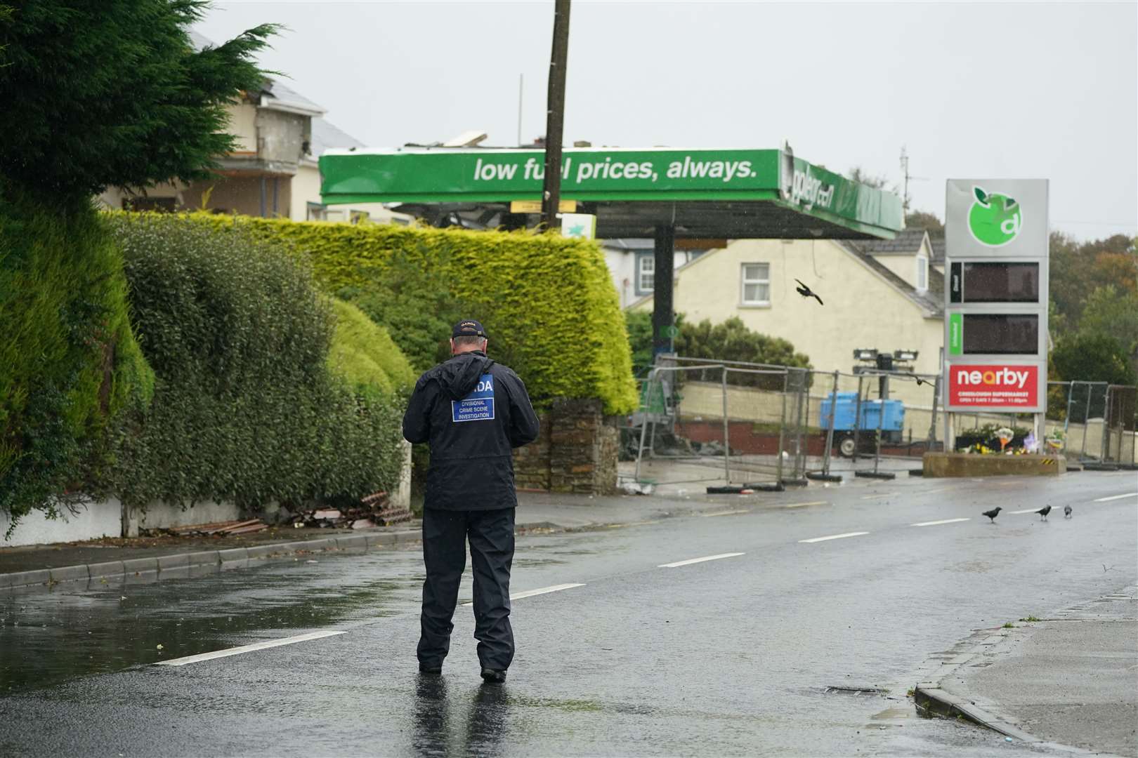 A Garda crime scene investigator at the scene of the explosion (Brian Lawless/PA)