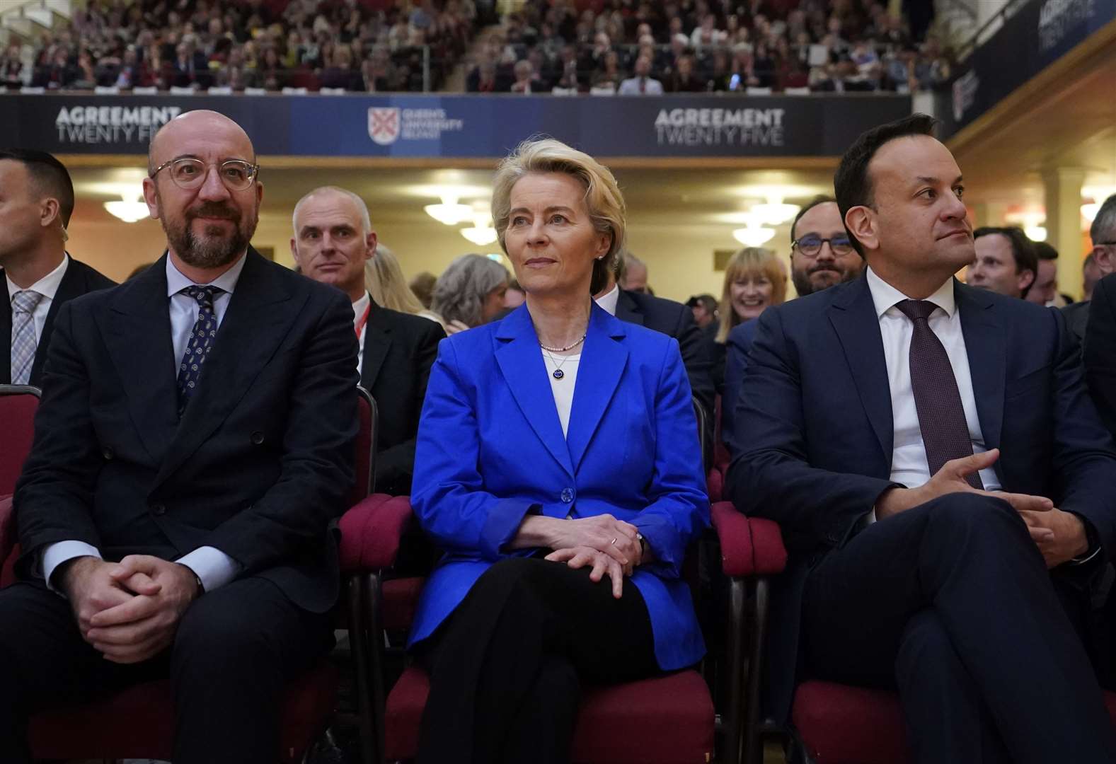 European Council president Charles Michel, President of the European Commission Ursula von der Leyen and Taoiseach Leo Varadkar sit together at Queen’s University Belfast (Niall Carson/PA)