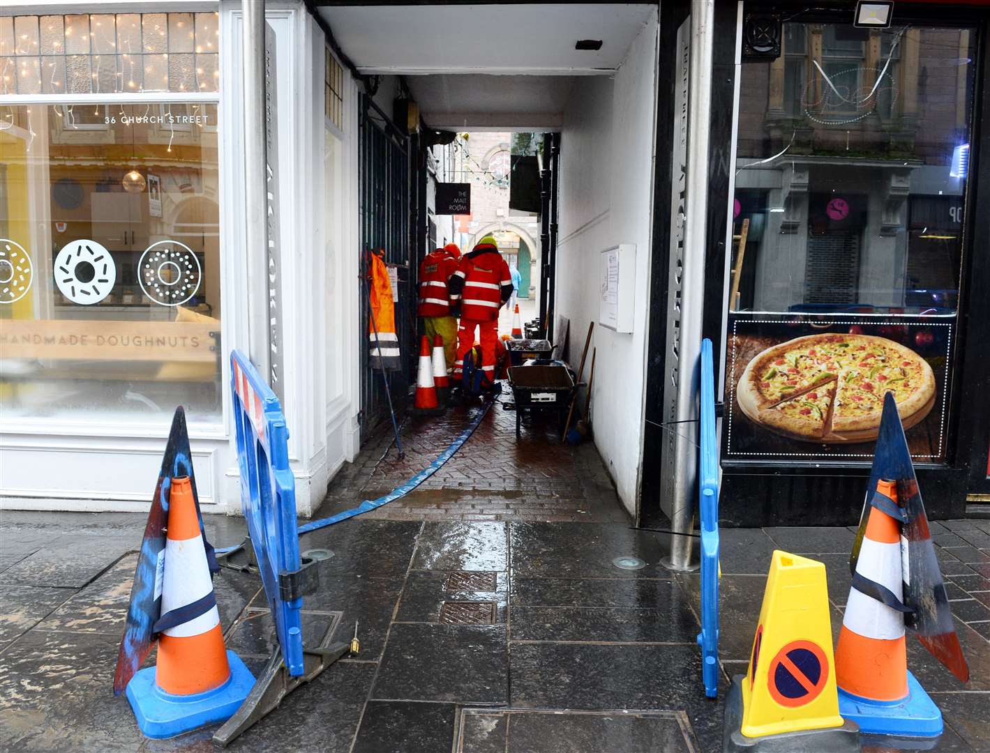 Workmen dig up the entrance at Market Lane off Church Street...Picture: Gary Anthony..
