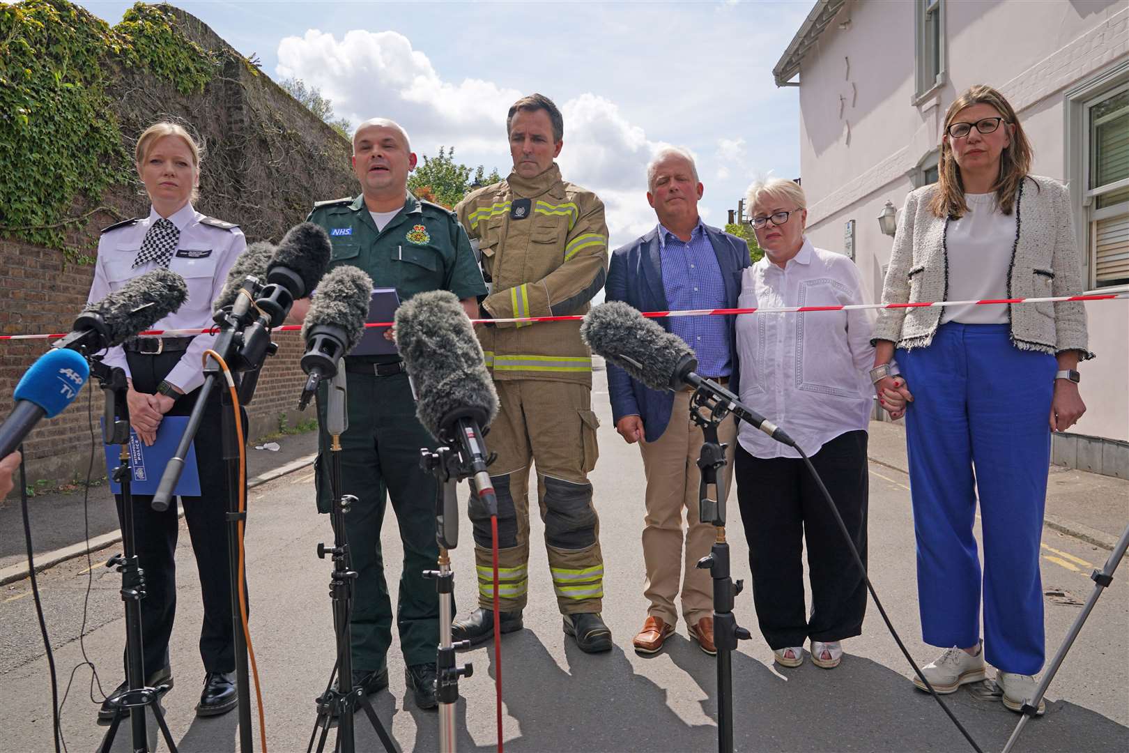 Metropolitan Police Detective Chief Superintendent Clair Kelland, left to right, Chief Paramedic Dr John Martin from the London Ambulance Service, Andrew Pennick, London Fire Brigade, and school governor John Tucker, speak to the media (Yui Mok/PA)
