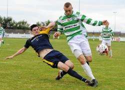 There's no way past Clach's Jamie Doran for Buckie Thistle striker Kai Ross.