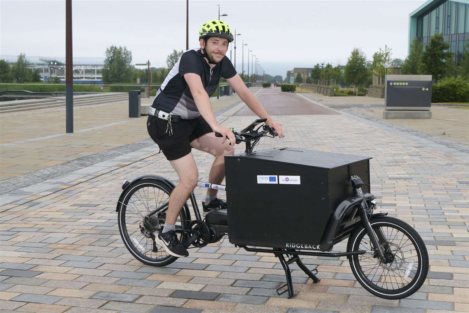 Matthew Lafferty, of Laughing Tree Couriers, on the electric cargo bike.