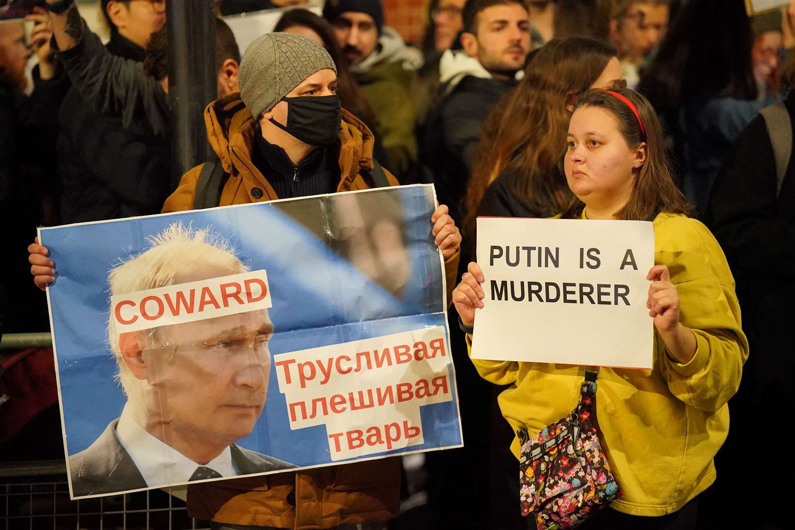 People take part in a protest opposite the Russian Embassy in London (Jonathan Brady/PA)