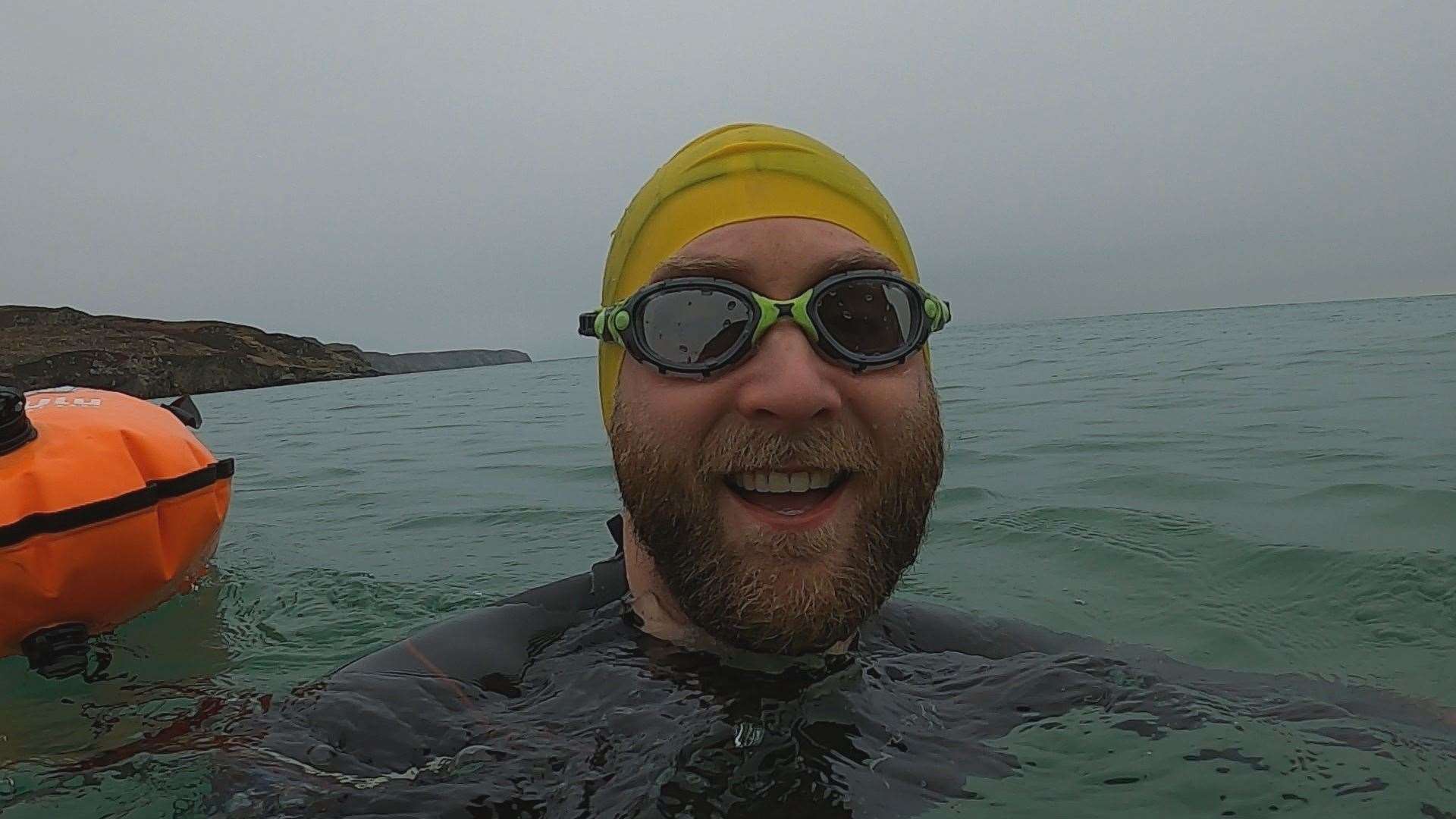 Calum Maclean enjoying a dip in the sea.