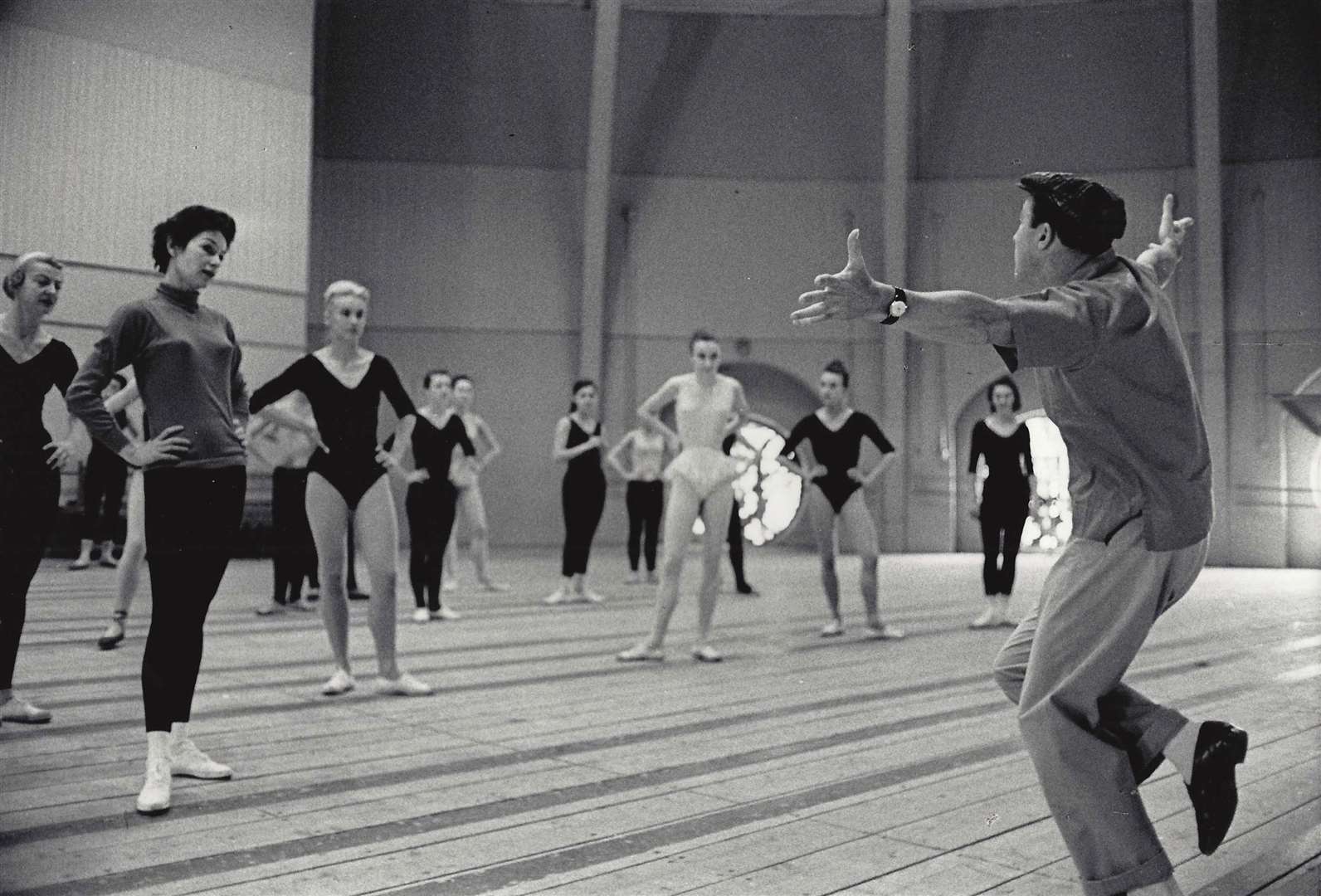 Gene Kelly reheasrsing with the dancers of Paris Opera Ballet with French star Claude Bessy (third from left. Picture: Roger Pic