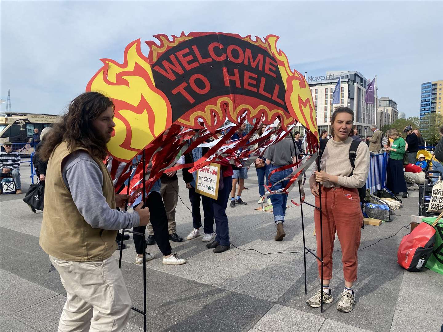 Climate protesters gathering outside the Excel centre in east London ahead of oil giant Shell’s annual general meeting (Rebecca Speare-Cole/PA)