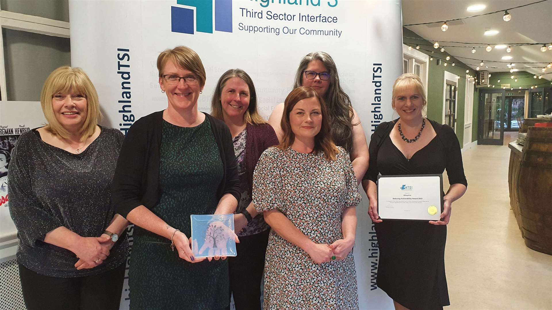 Members of the Mikeysline team celebrating at the HTSI Awards night. Pictured (l-r) are Bonnie McColl, office manager; Donna Smith, chair; support workers Maria Kelly, Donna Brady, and Emilie Roy; and Emily Stokes, CEO.