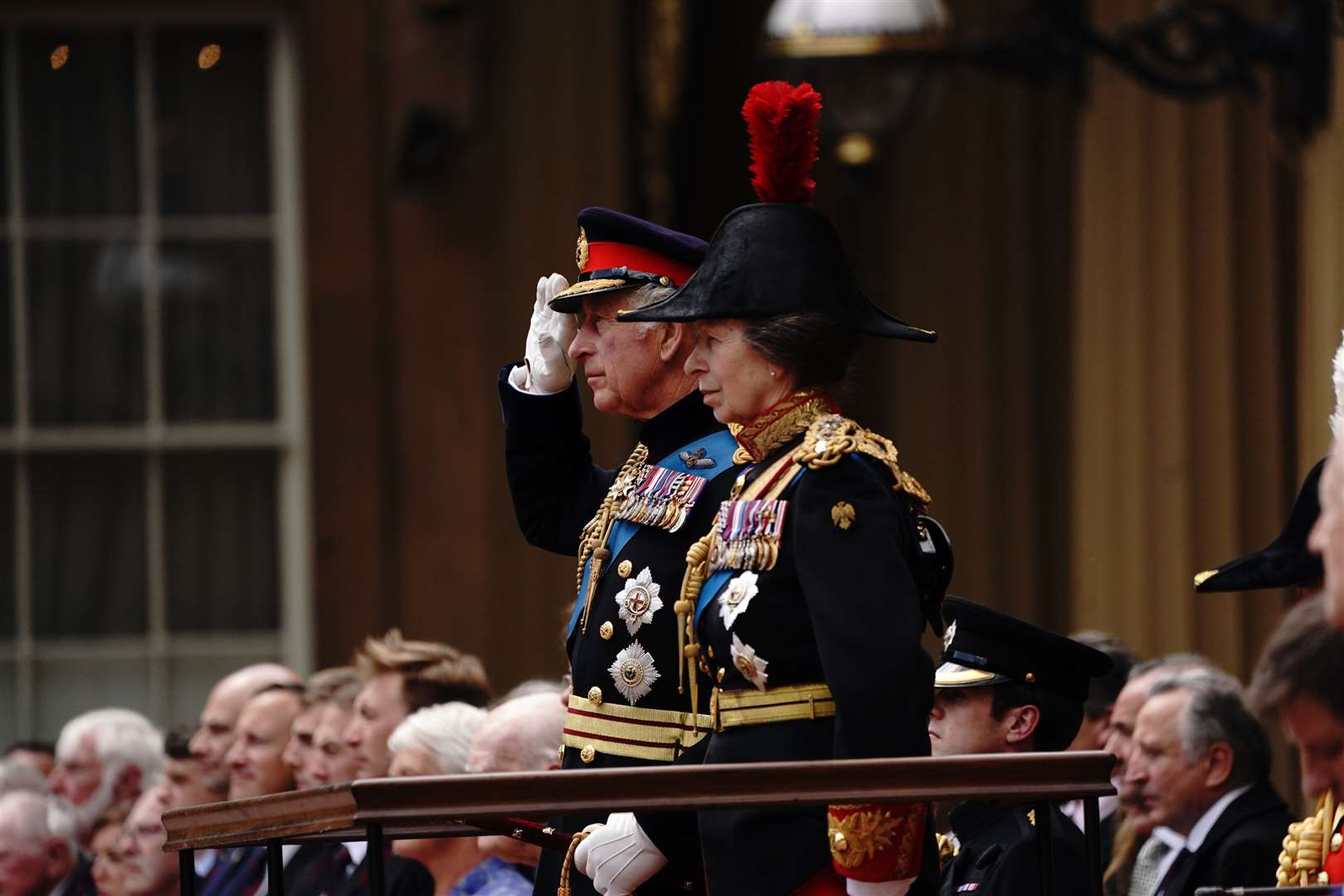 The King salutes, alongside the Princess Royal, during the ceremony (Victoria Jones/PA)