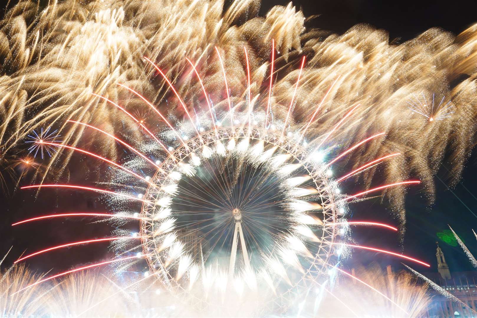 The London Eye sat at the centre of the New Year’s Eye firework extravaganza (Victoria Jones/PA)