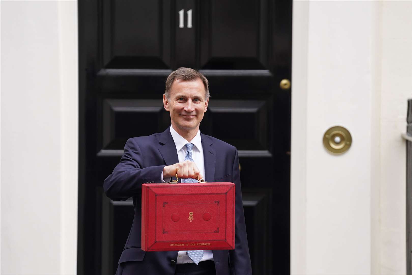 Chancellor Jeremy Hunt leaves 11 Downing Street with his ministerial box (Stefan Rousseau/PA)