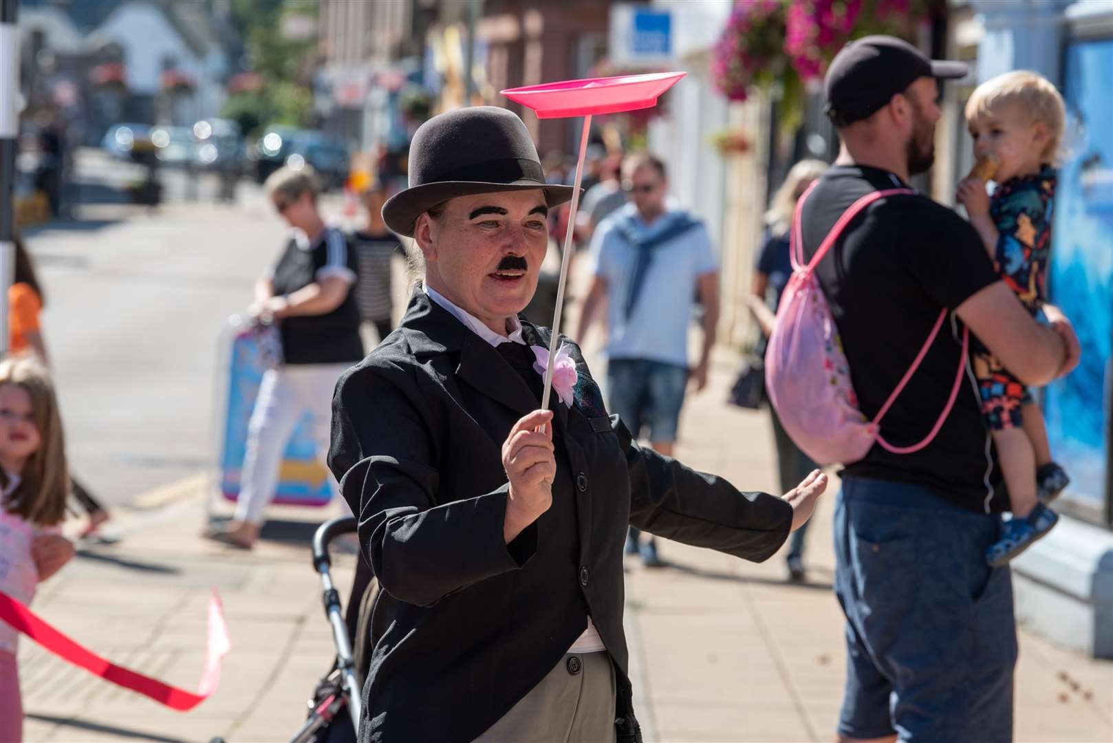 Charlie Chaplin at the Nairn Book & Arts Festival opening parade. Pictures: Marc Marnie.
