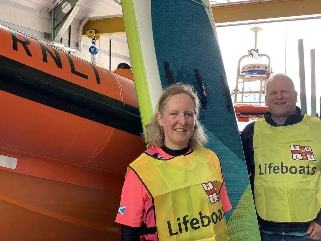Morag Fraser and her husband, Graham, call in at the RNLI Loch Ness station before she embarks on her challenge.