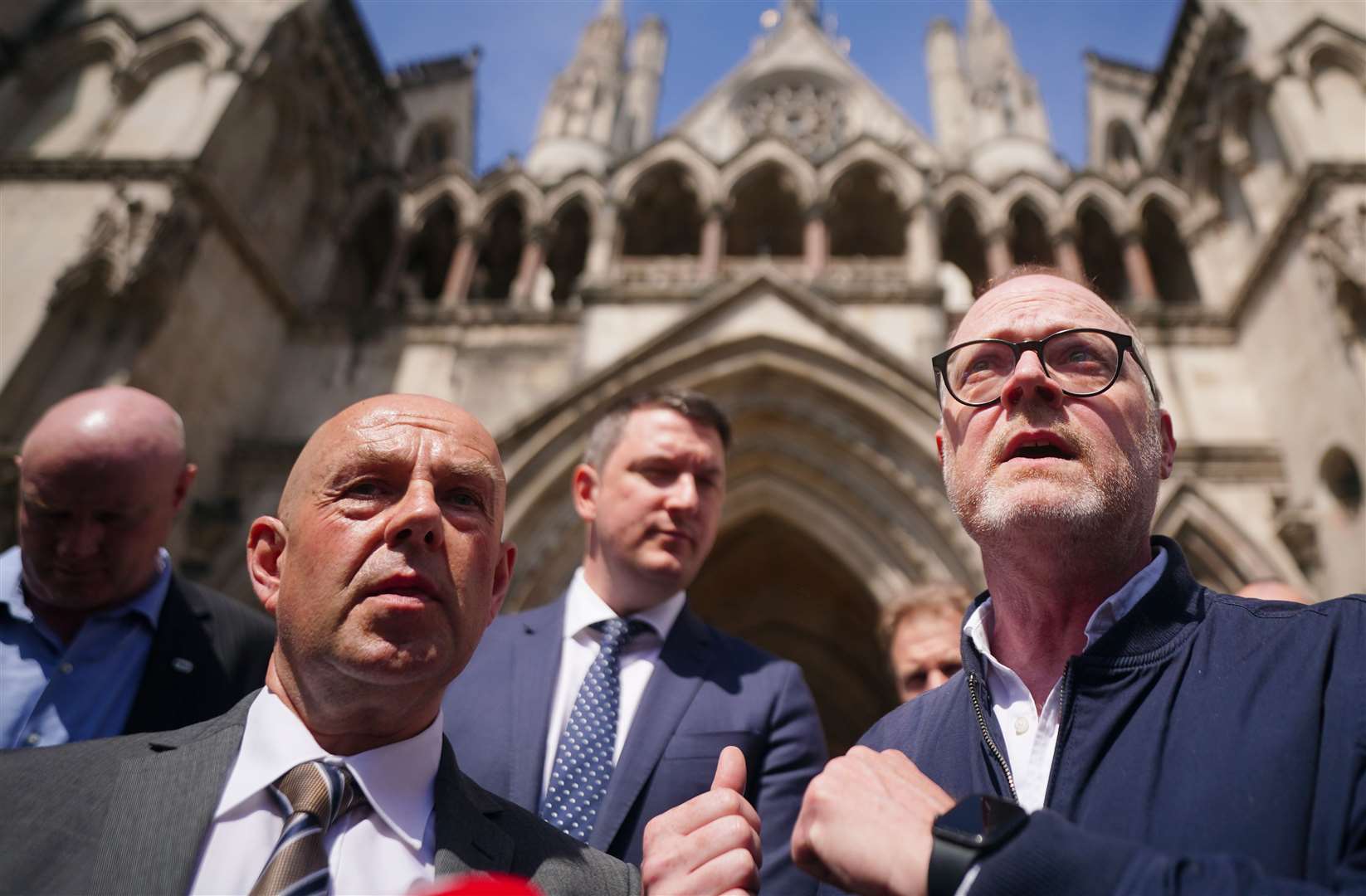 Journalists Barry McCaffrey (left) and Trevor Birney (right) speaking to media after leaving the Royal Courts of Justice in London following an Investigatory Powers Tribunal hearing (Victoria Jones/PA)