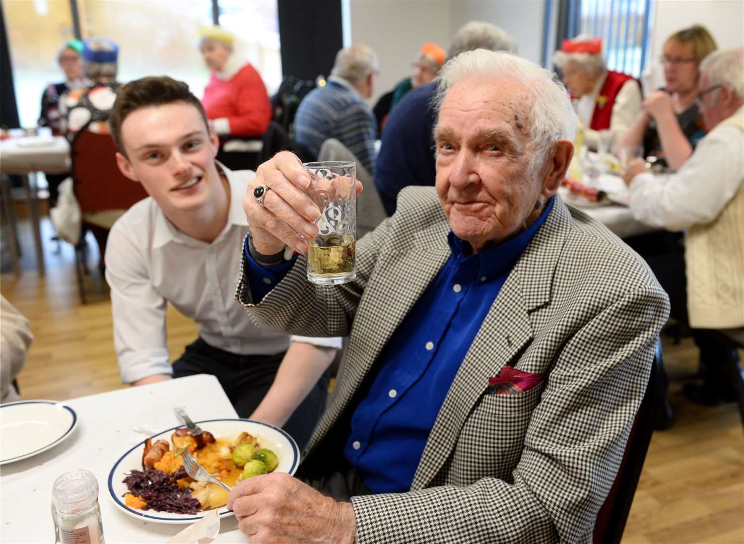 Raising a glass is Raymond Hersee with pupil Matthew Laughton.
