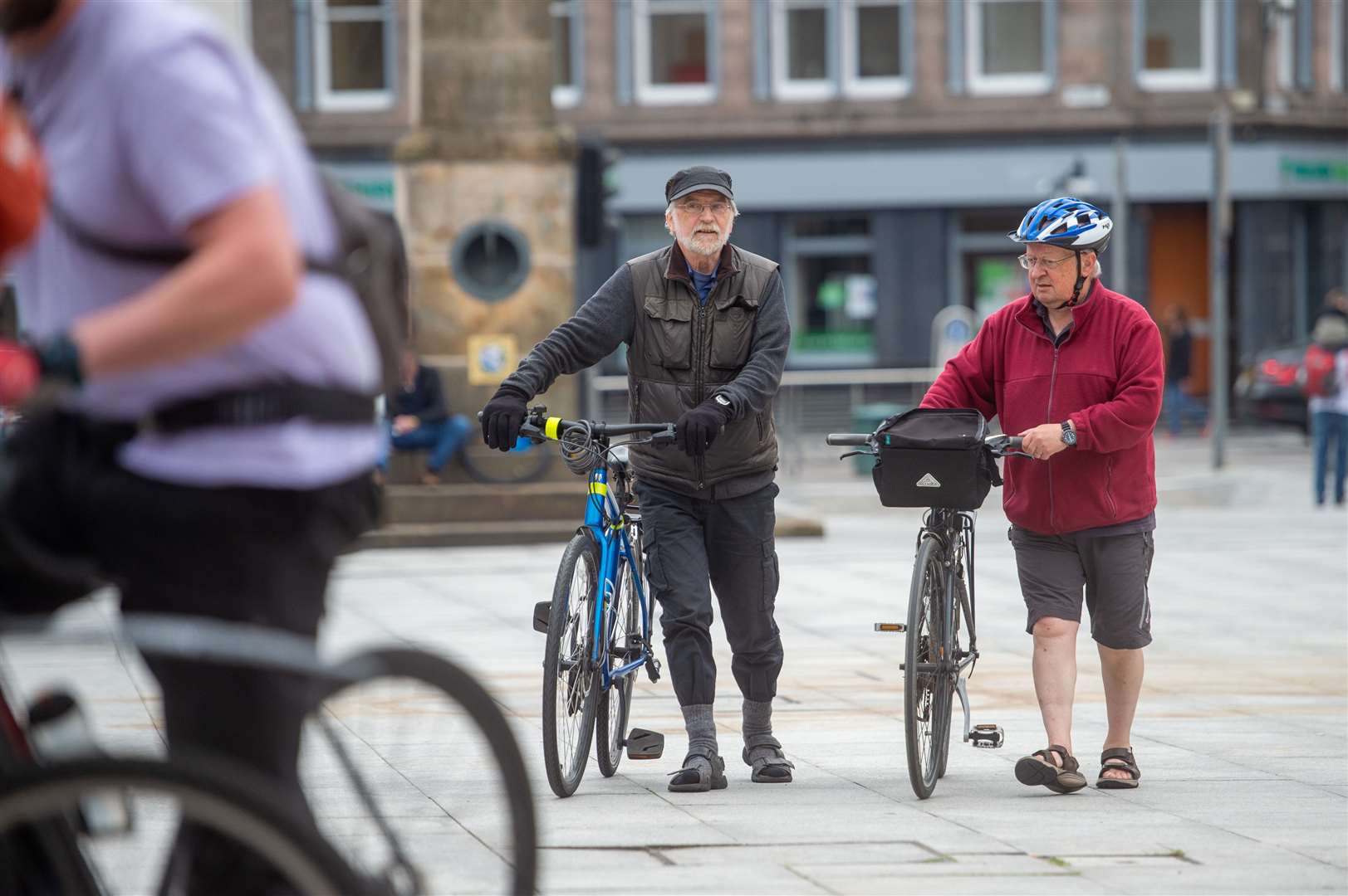 Participants push their bikes. Picture: Callum Mackay