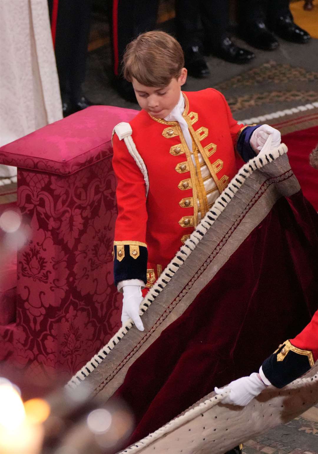 Prince George performs his duties at the coronation ceremony of his grandfather, the King (Aaron Chown/PA)