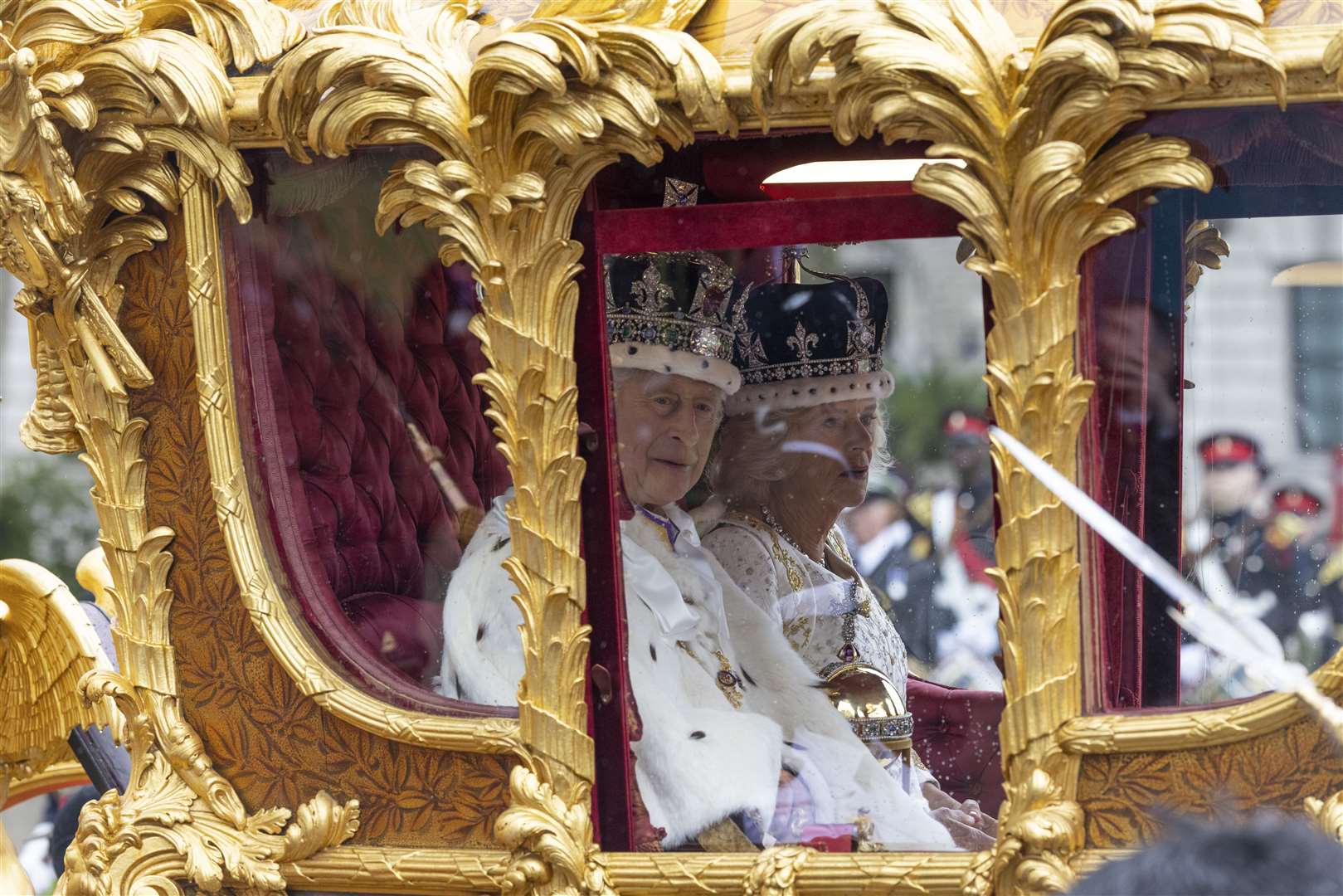 The King and Queen travel in the Gold State Coach to Buckingham Palace after the coronation (David Rose/The Telegraph)