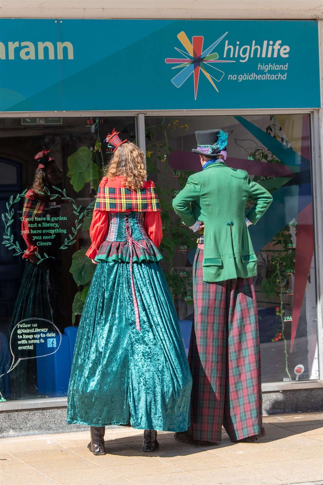 Stilt Walkers at the Nairn Library which was the scene of story-telling on the opening day. Pictures: Marc Marnie.