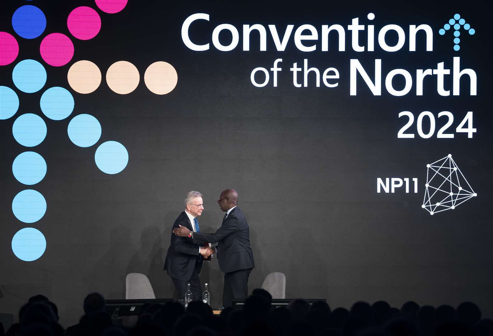 Michael Gove was welcomed on stage by host Clive Myrie (Danny Lawson/PA)