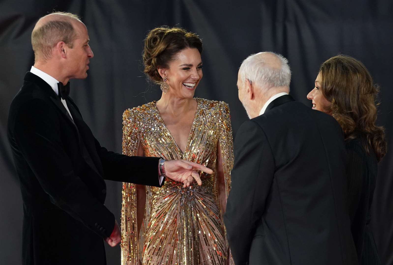 The Duke and Duchess of Cambridge are greeted by Barbara Broccoli (right) and Michael G. Wilson (second right) (Jonathan Brady/PA)