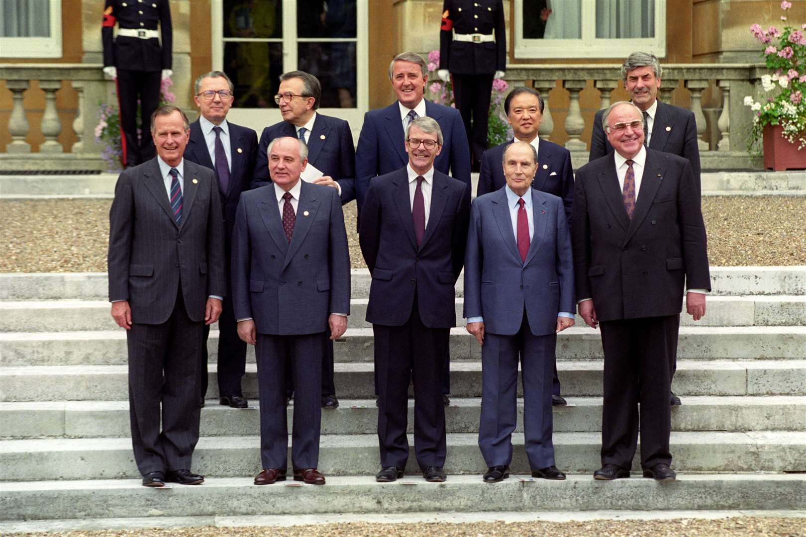 John Major stands on the terrace of Lancaster House with members of the G7, including Mikhail Gorbachev and US President George Bush (David Giles/PA)