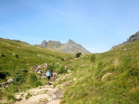The distinctive outline of The Cobbler on the ascent path and right, Tom makes his way up.