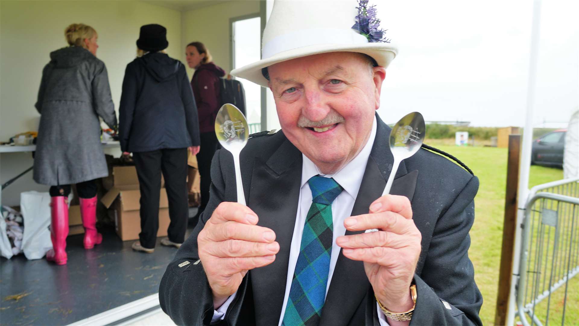 Compere at the event Willie Mackay was delighted to receive an engraved set of silver spoons. Willie is well known for his spoon playing skills and played a tune minutes after receiving his gift. Picture: DGS