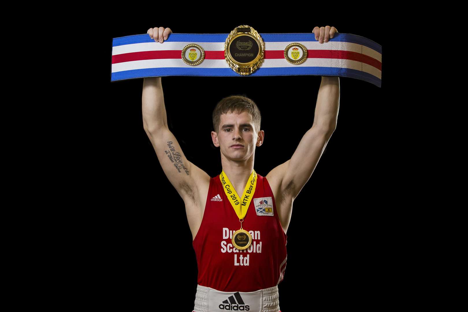 Highland Boxing Academy's John Duncan took the Lonsdale belt and a gold medal from the Lonsdale Box Cup. Picture: David Rothnie