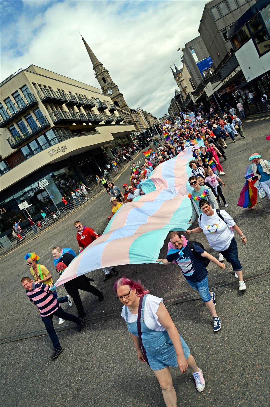 A giant flag in support of the transgender community making its way at the 2019 march. Picture: Gair Fraser