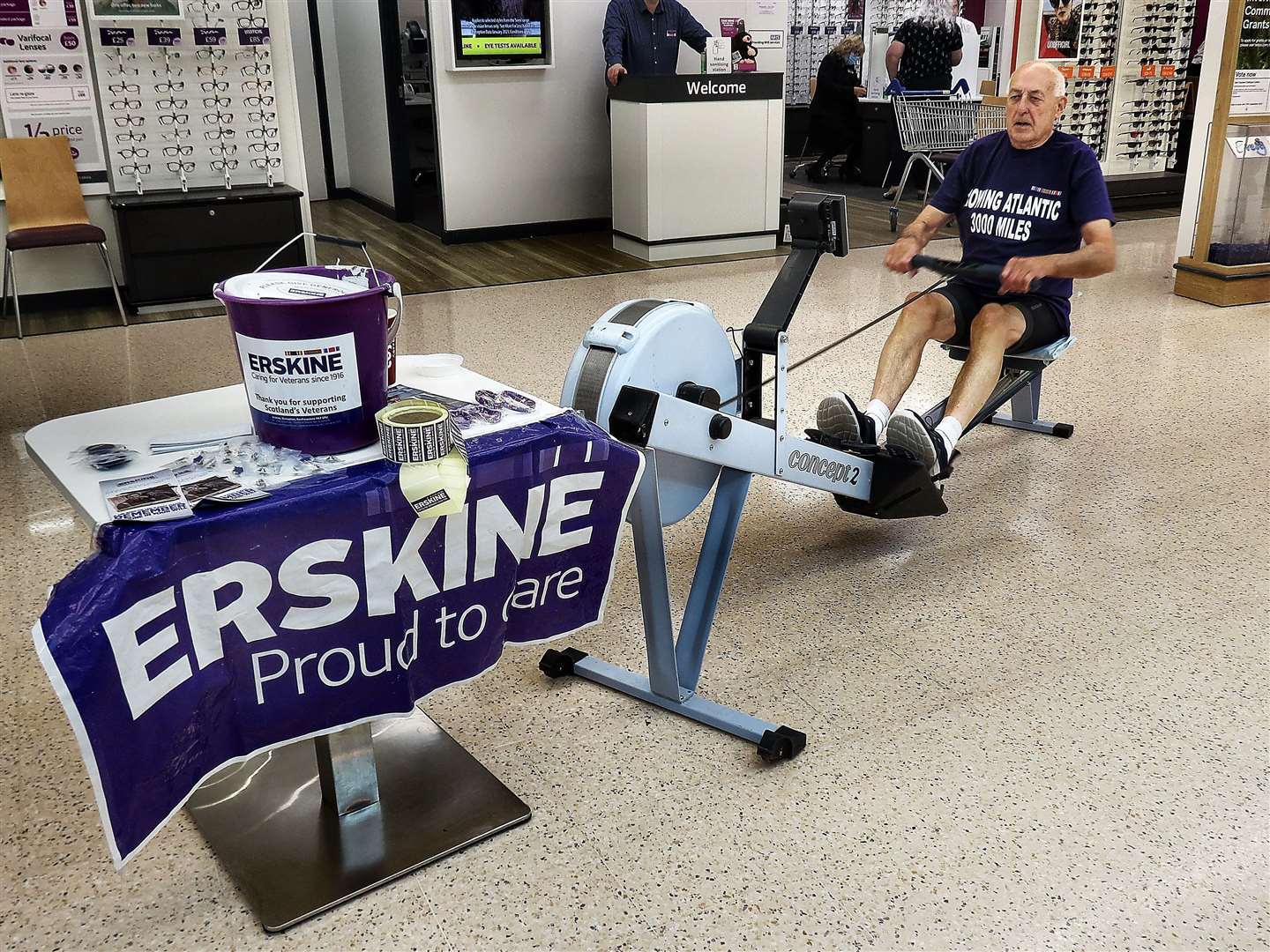 Johnnie Baillie spending his 80th birthday “rowing the Atlantic” at Tesco Retail Park store on 21st July last year.