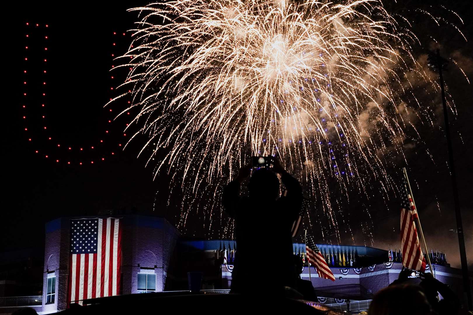 People watch as fireworks go off after the speeches (Andrew Harnik/AP)