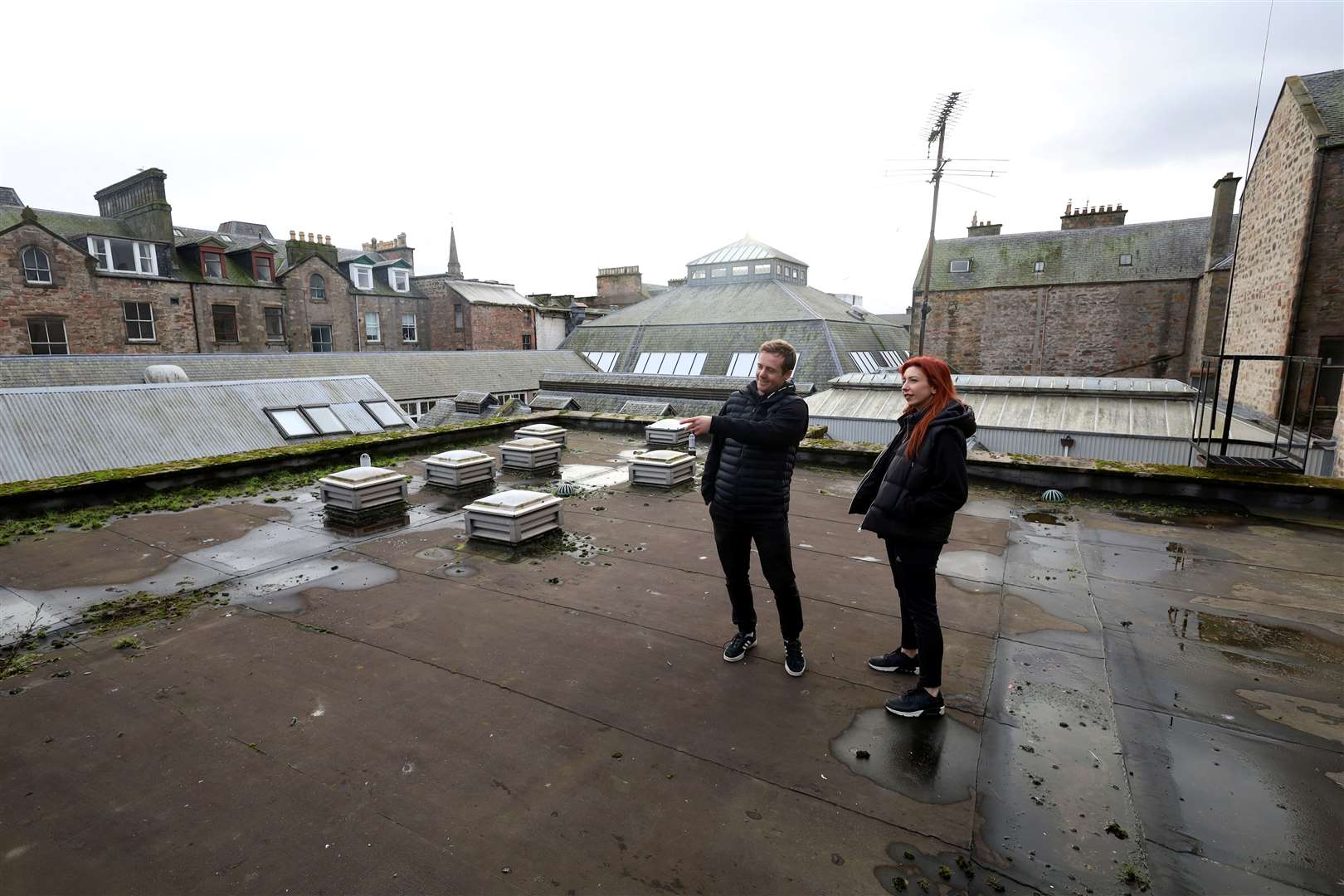 Taran and Kirsty Campbell on the roof of the building. Picture: James Mackenzie.