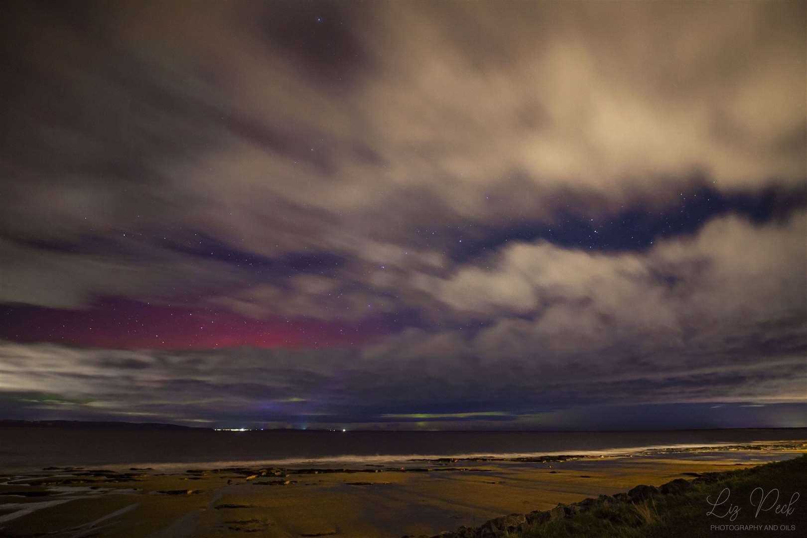 A rare example of red glare from the Northern Lights captured on the Nairn Seafront. Picture by: Liz Peck photography.