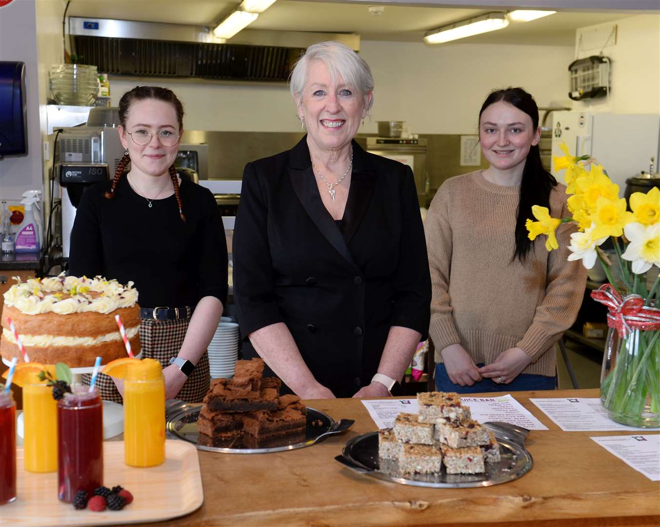 Café enabler Niamh Martin with Cantraybridge College chief executive Hazel Clark and café assistant Rachel Ward. Picture: Gary Anthony