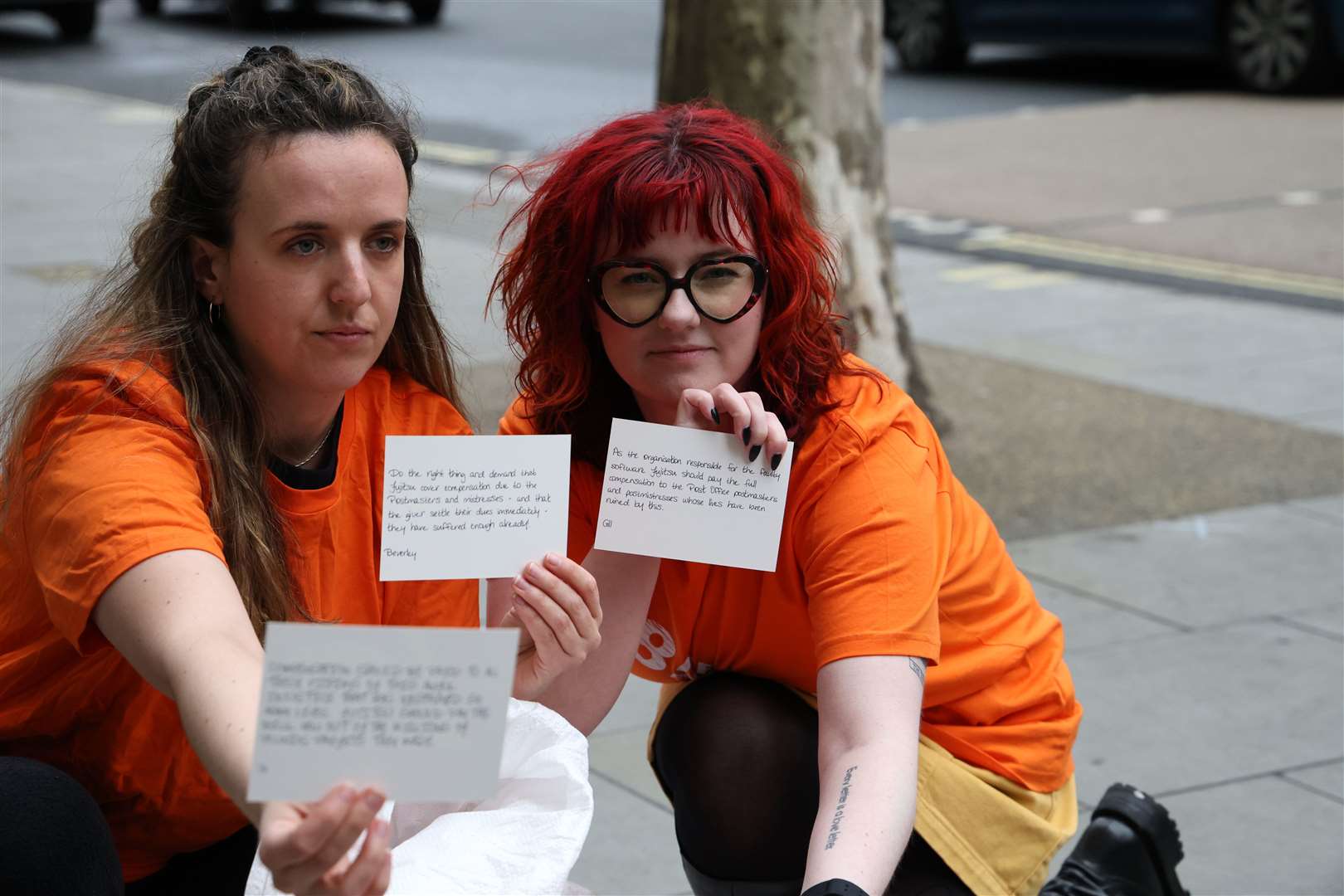As the Post Office Horizon inquiry reopens, campaign group 38 Degrees delivers postcards from 10,000 members of the public, demanding full compensation for victims paid for by those responsible for the scandal (Nigel Howard/PA)
