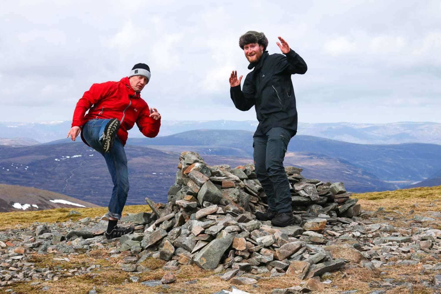 Capers at the cairn: Hector and James celebrate a summit.