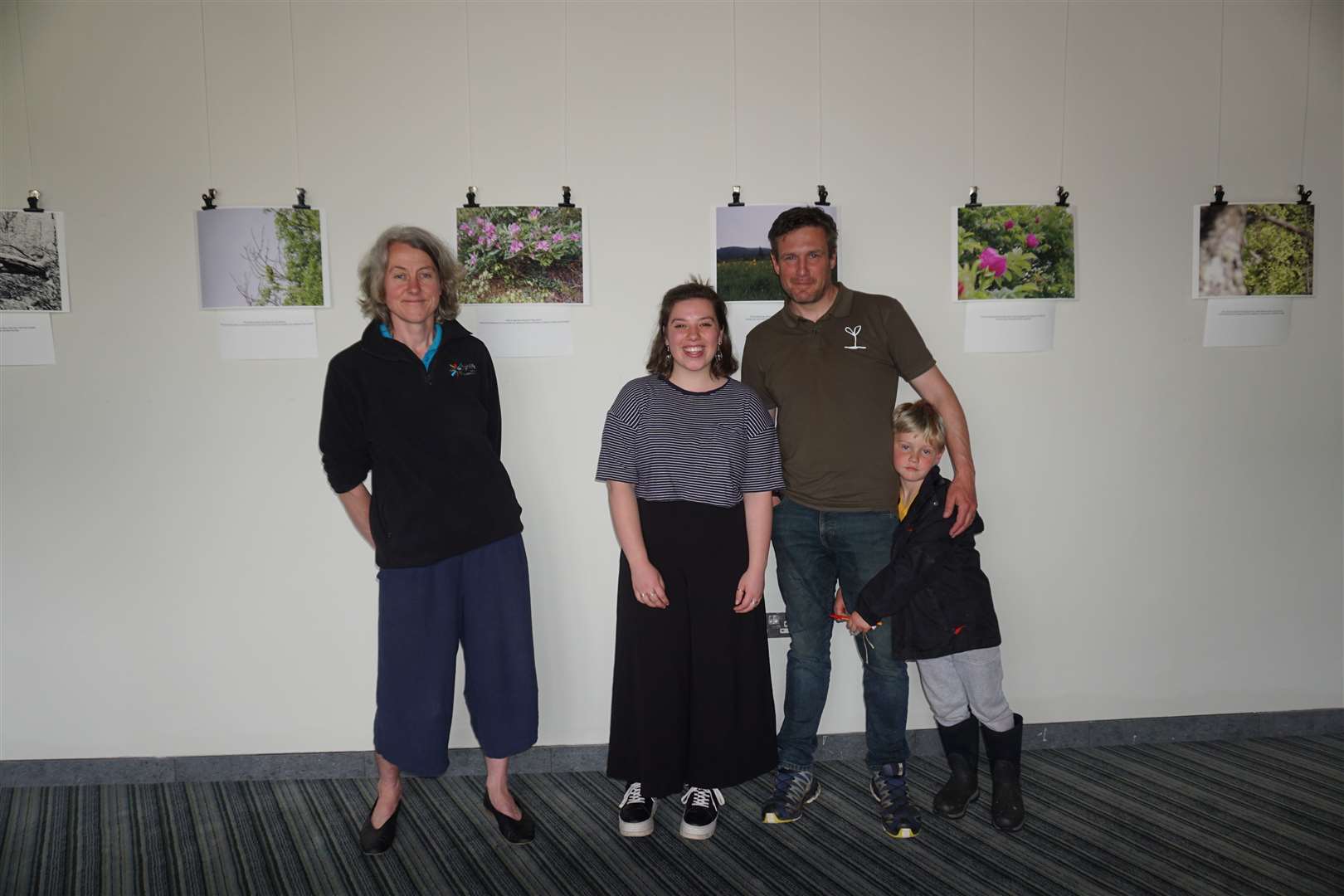 Imogen Furlong (Outdoor Activities Manager for High Life Highland), Mollie Saunders and Alan McDonnell (Programme Development Manager at Trees for Life) at the exhibition opening. Pictures bu: Federica Stefani.
