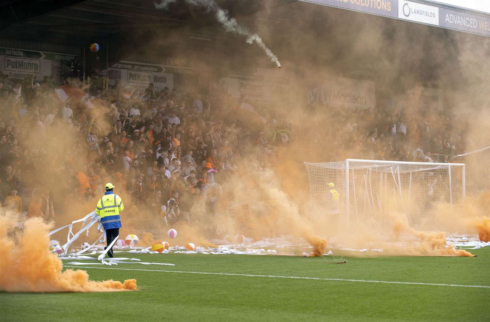 Dundee United fans' smoke-bombs hold up the game’s start for five minutes. Picture: Ken Macpherson